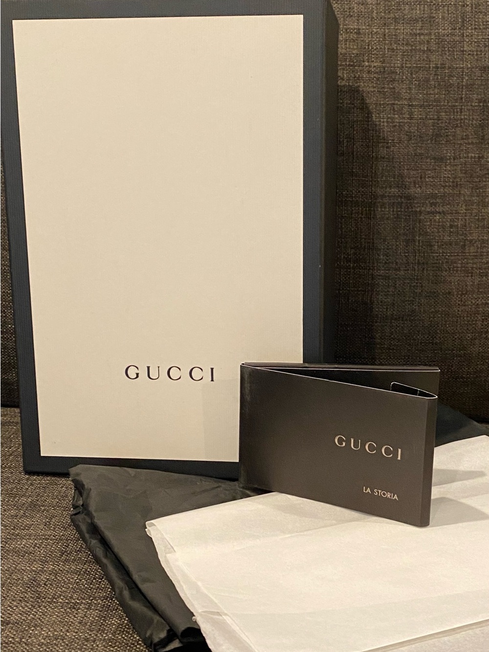 Gucci Cream Box with Black Trim and Black Booklet cover. GUC.